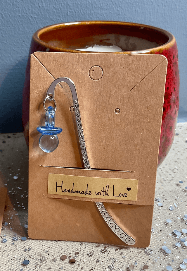 Christening and baby shower gift. Handmade bookmark with baby soother.