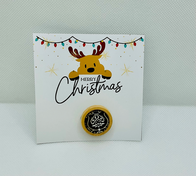 Handmade brooch with Christmas card.
