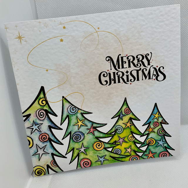 Personalised Christmas card. Colourful Christmas’s trees.
