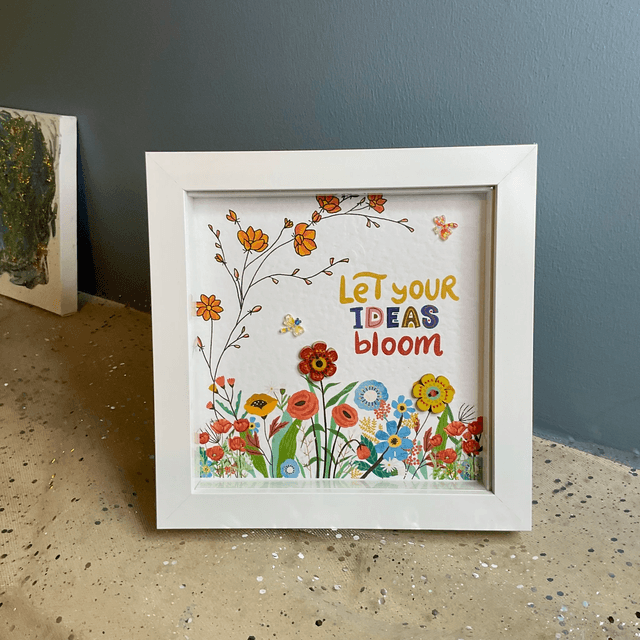 Buttons frame with inspirational quote.Flower design