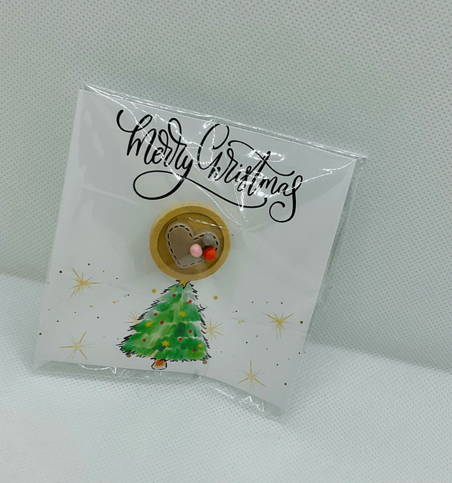 Handmade brooch with Christmas card.