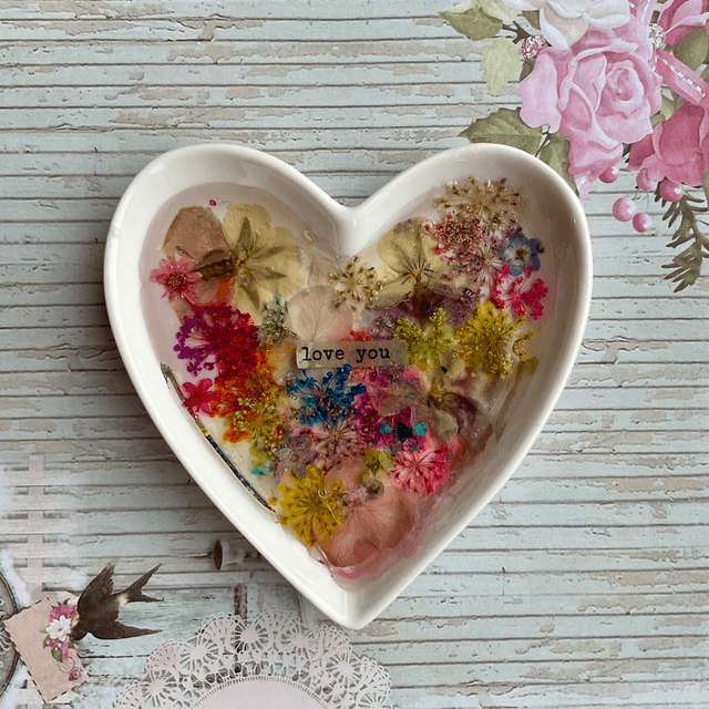 White porcelain ring trinket with pressed flowers in resin.