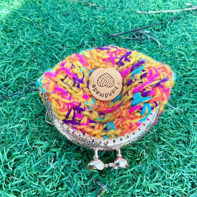 Handmade crochet coin purse. Rainbow design.