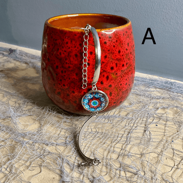 Handmade bracelet with colourful glass cabochon.