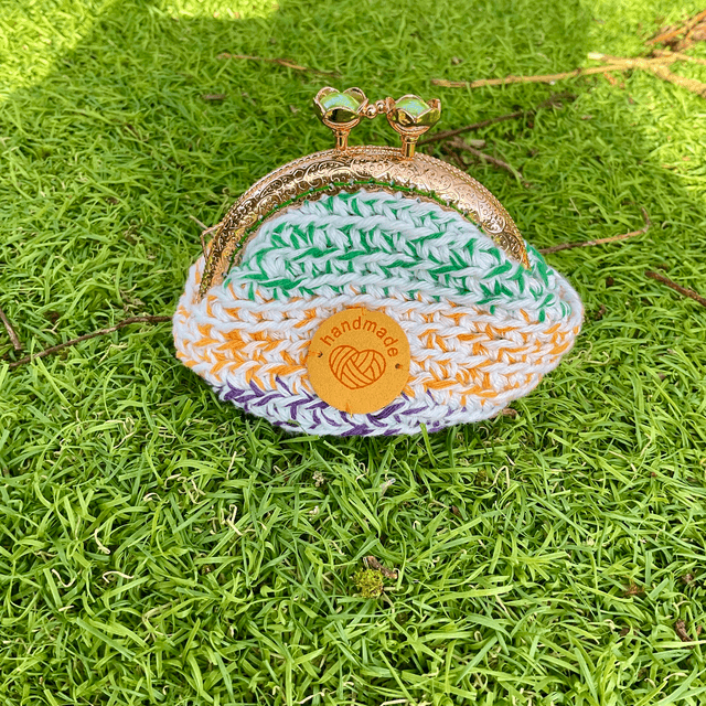Handmade crochet coin purse. Rainbow design.