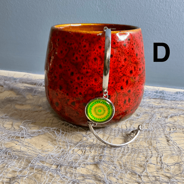 Handmade bracelet with colourful glass cabochon.