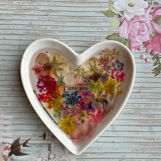 White porcelain ring trinket with pressed flowers in resin.