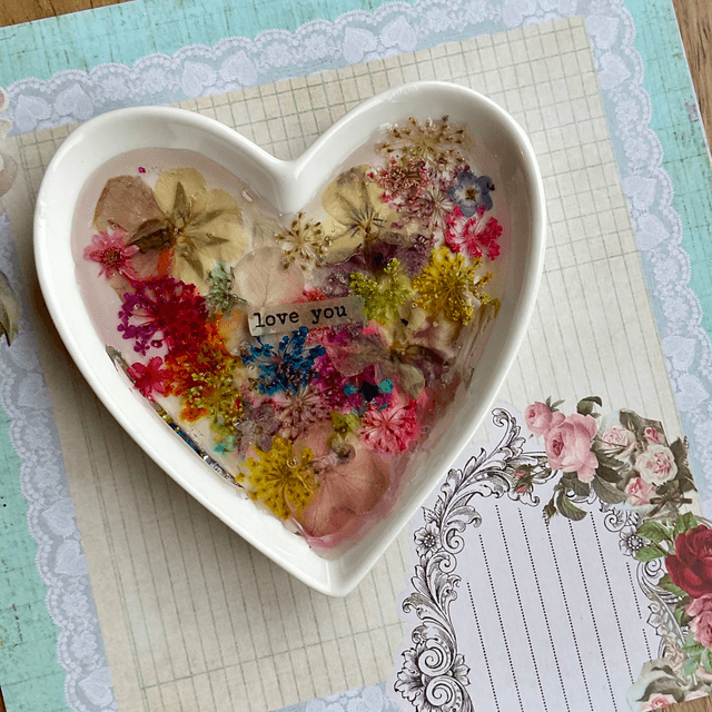 White porcelain ring trinket with pressed flowers in resin.