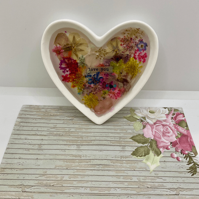 White porcelain ring trinket with pressed flowers in resin.